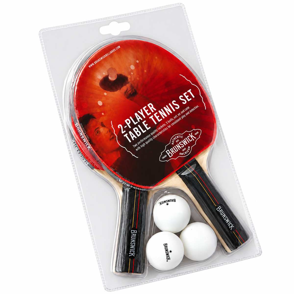 A 2-player table tennis set in its original blister packaging, featuring two paddles with red and black rubber, three white balls, and black handles with red and green stripes. The brand 'Brunswick' is clearly visible on the paddles and balls.