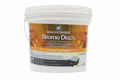 A white plastic bucket of Beachcomber Bromo Discs treatment, featuring a label with orange and brown tones and product details, isolated on a white background.