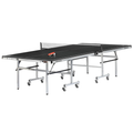 Brunswick Smash 7.0 ping pong table with a black top, white lines, silver folding frame, caster wheels and net.