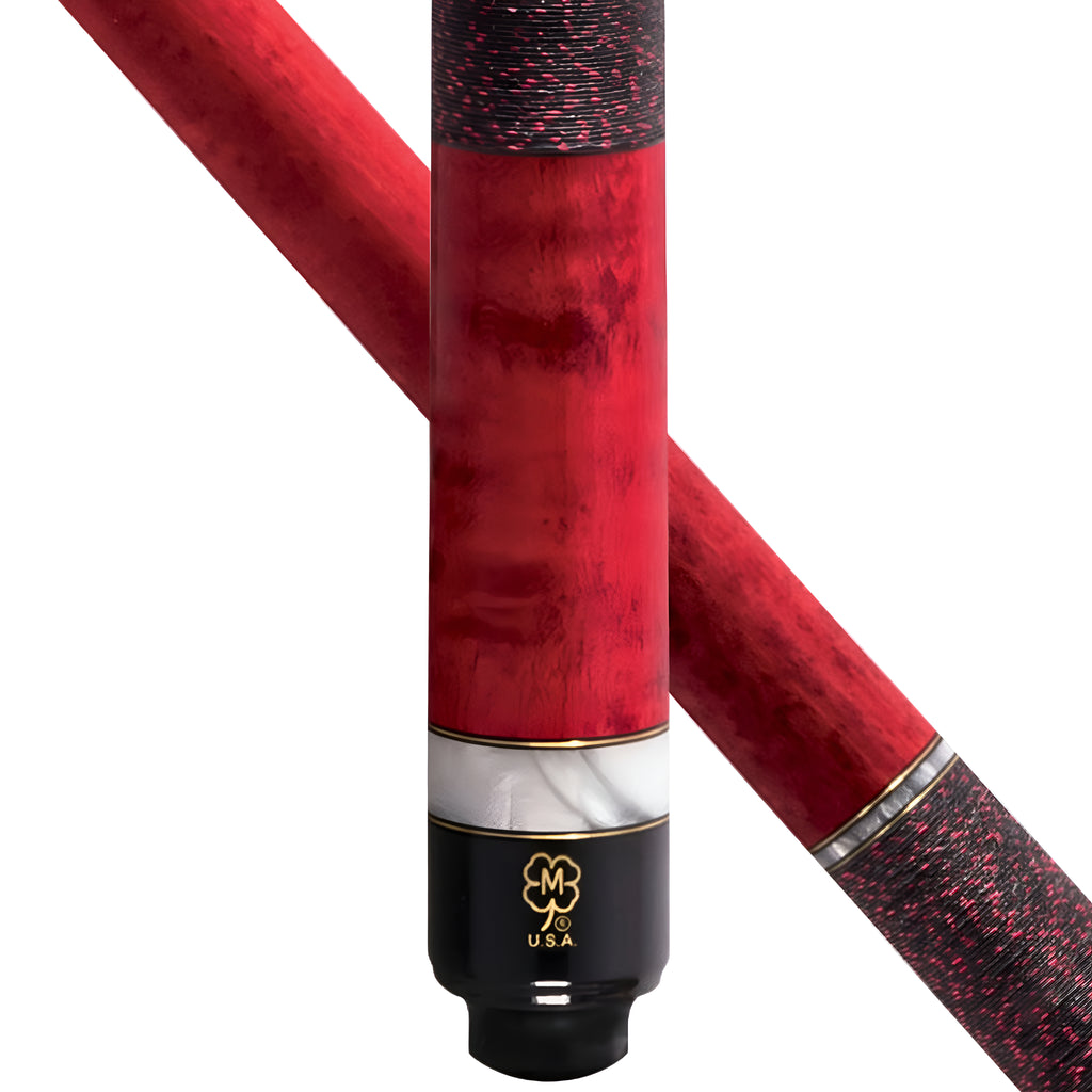 Close-up studio shot of a red billiards cue with a black and red textured grip, a white marble band, and a black end cap featuring a gold monogram logo and 'USA' text, shown against a white background.