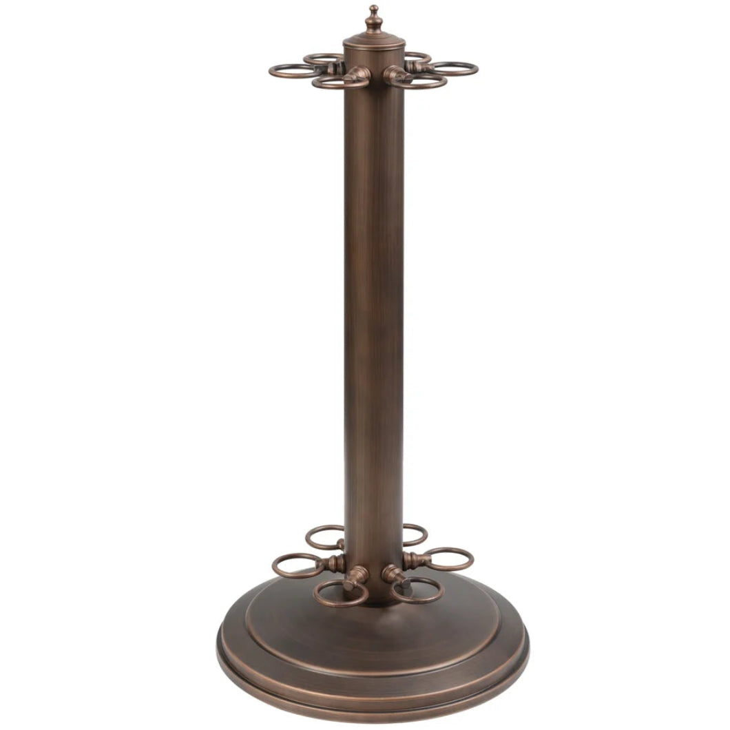 A Bronze metal cue stand that holds 6 cues with a round base on a white background