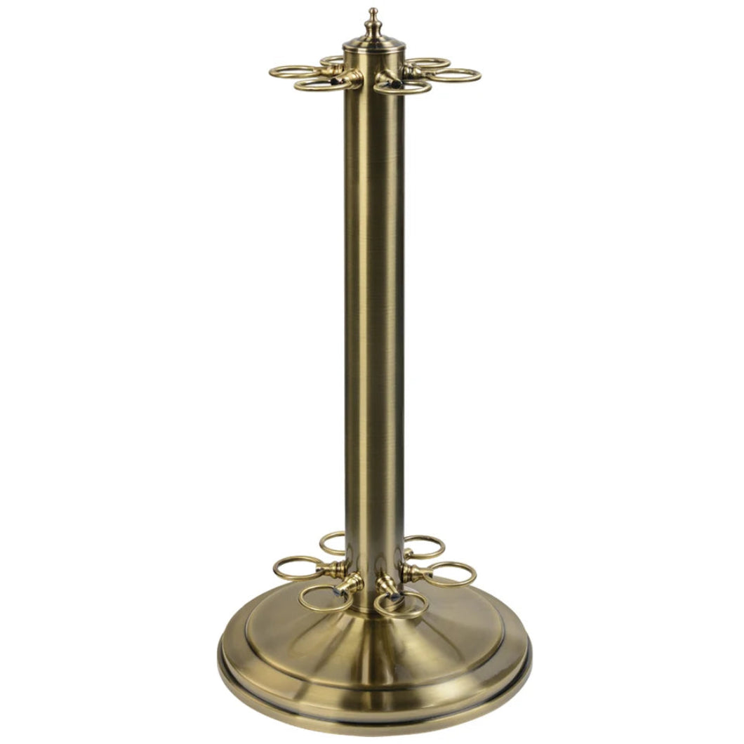 A Antique Brass metal cue stand that holds 6 cues with a round base on a white background