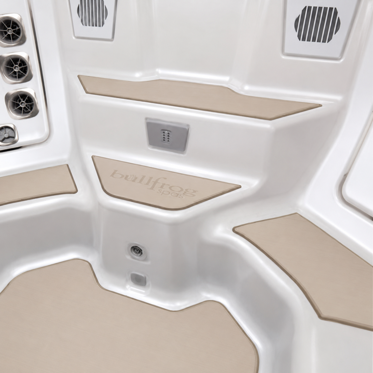 Beige non-slip deck mats installed on a white Hot tub interior, including a central step and seating areas. The brand name 'ballfrog' is embossed on one mat.