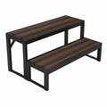 A two-step outdoor bench with dark brown composite wood-look slats and a black metal frame, shown on a plain white background.