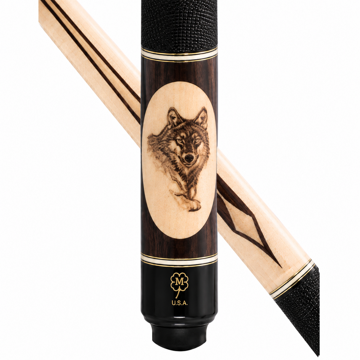A close-up studio shot of a wooden pool cue shaft with a black textured grip, a carved oval panel showing a wolf head, and gold detailing, with the matching light wood tip visible behind it on a white background.