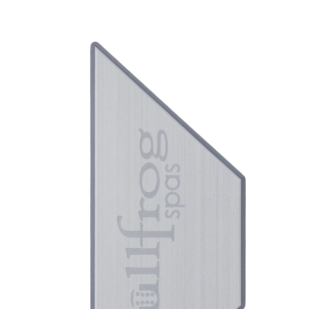 A close-up of a grey textured non-slip mat with the words 'Bullfrog spas' printed vertically in a matching lighter tone, shown against a plain white background.